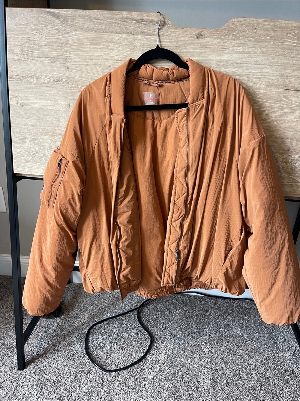 FP Movement by Free People Quilted Bomber Jacket in Rust Orange